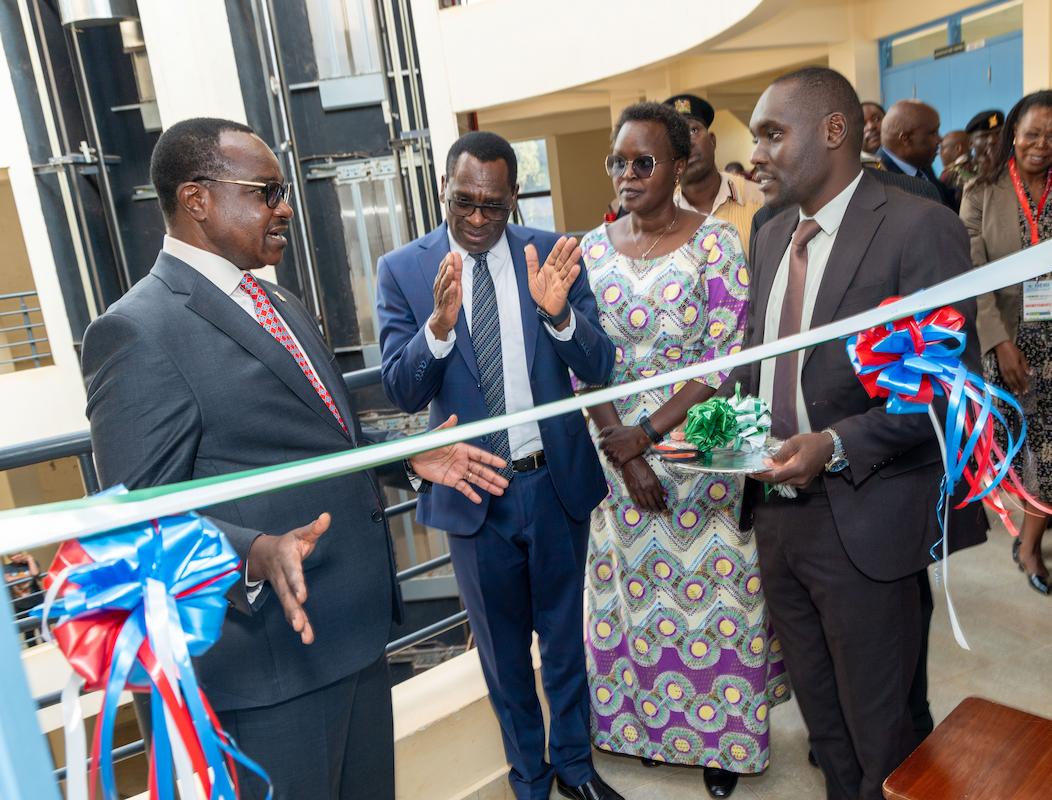 CS Ogamba with Kisii Vice Chancellor Prof Nathan Ogechi, Kisii University Chair of Council Dr Sara Ruto and other guests at Kisii University during the launch of HERI Africa.